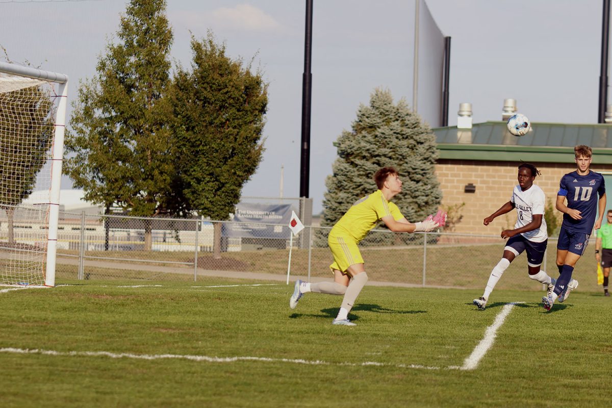 Senior Cayden Rotich is rushes the St James goalkeeper in hopes of scoring a goal. Tuesday Sept. 2.
