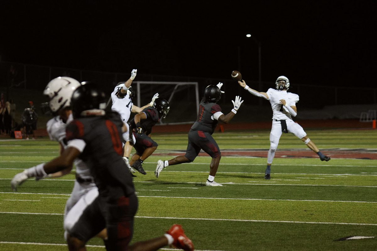 Senior Blake Jay throws the ball to one of his wide receivers. 
