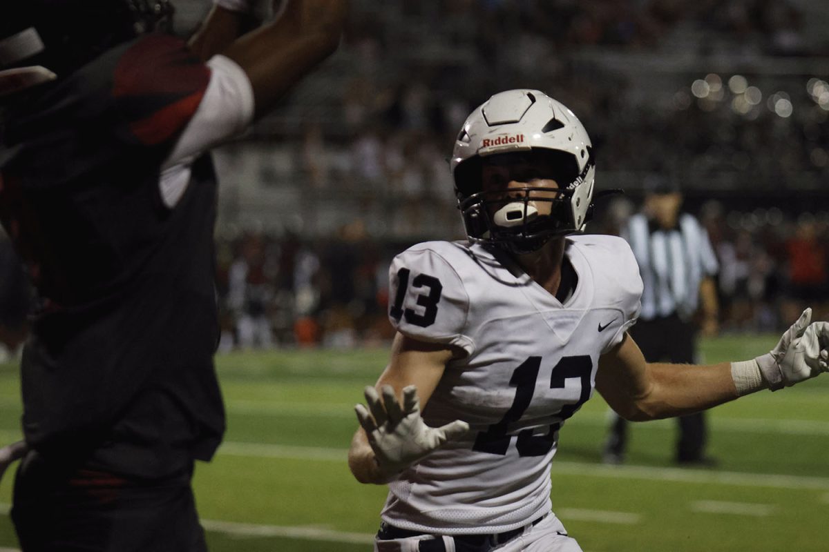 Senior Bryce Shorten waits for the ball to be thrown in the end zone.
