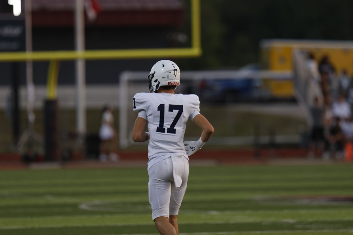 Junior Holden Applebee runs back to the next play call.