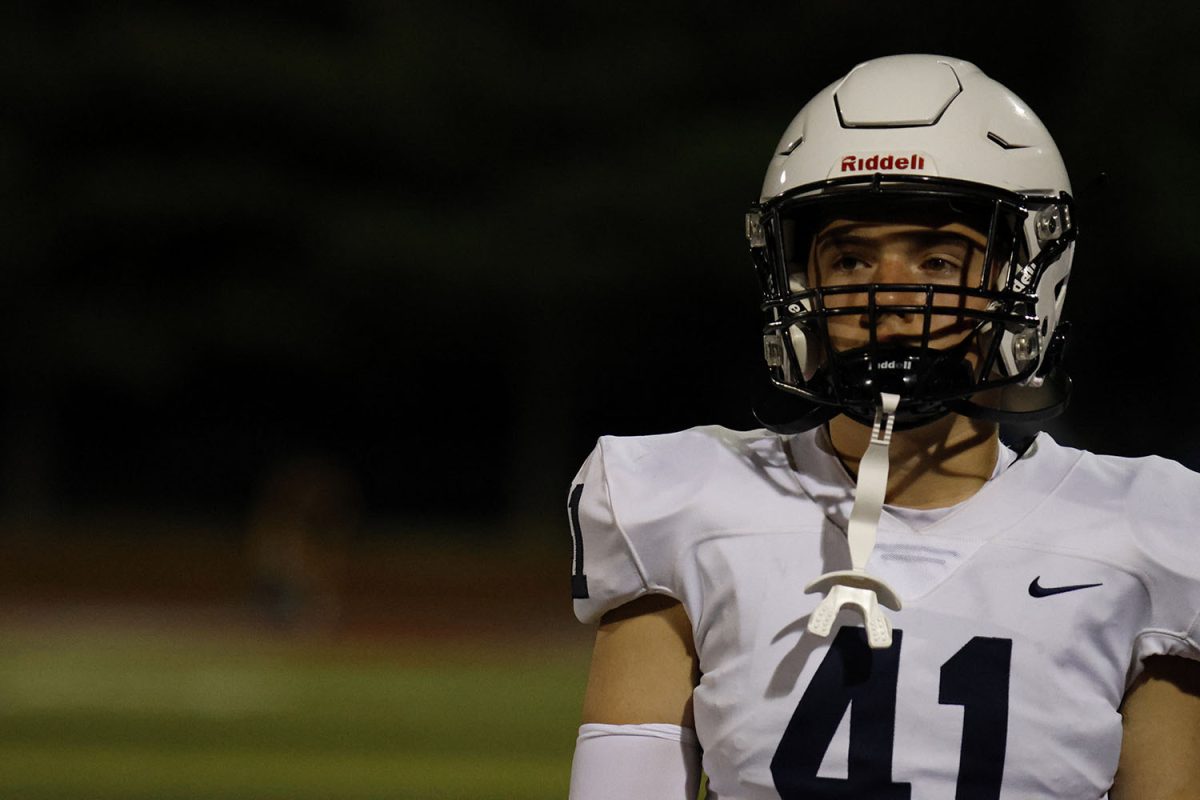 Sophomore Logan Schmidtlein waits for a play to start.
