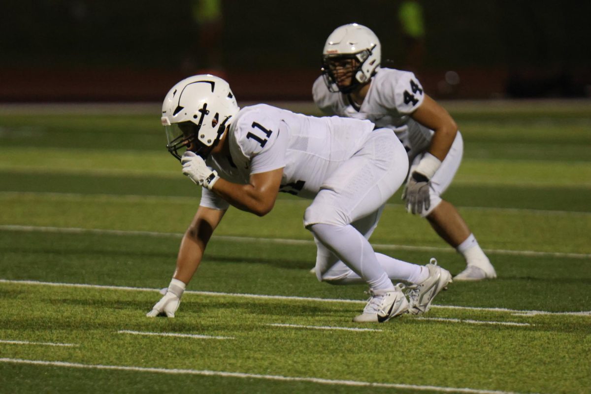 Junior Josh Garcia laser focused on getting the tackle during the game against Lee Summit North on Sept 10. 