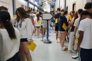 Excited for opening, many students wait in line for the Catty Shack. 