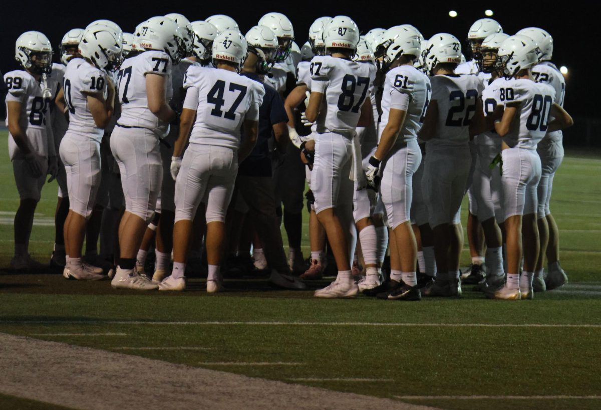 As the Jaguars huddle during a timeout, they discuss the plan for the next play.