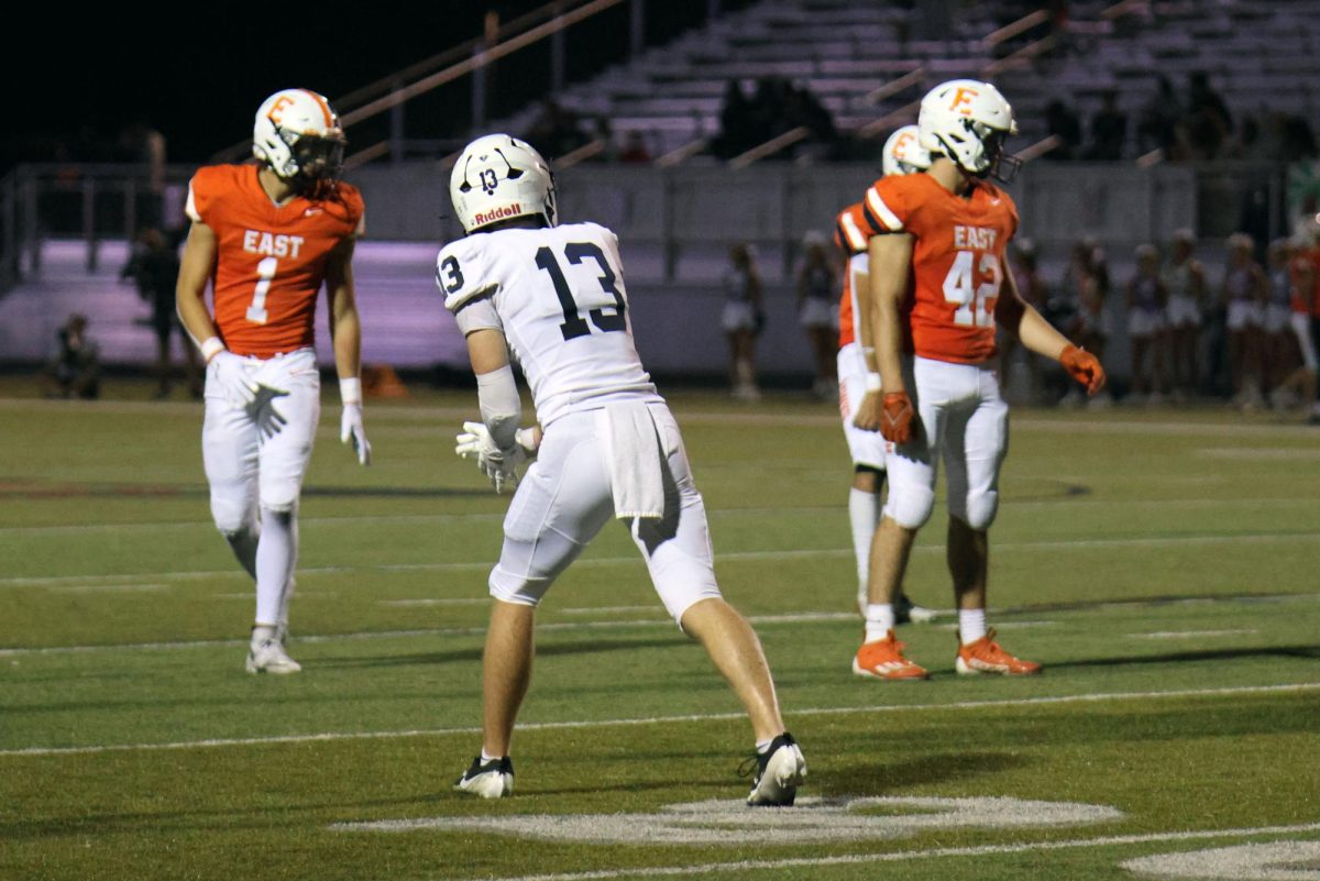 Senior Bryce Shorten prepares for the next play.