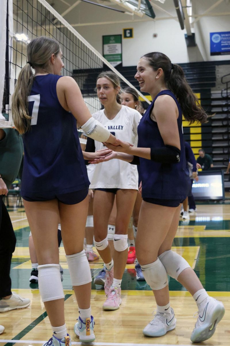 Excited, sophomores Ellie Bain and Sophia Sturdy celebrate their win. 