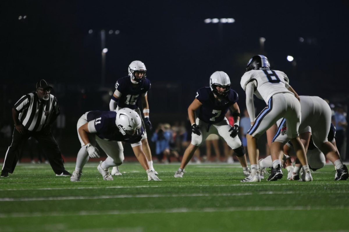 Junior Joshua Garica and Senior Jaxon Garcia set into stance waiting for the opposing quartbacks snap 