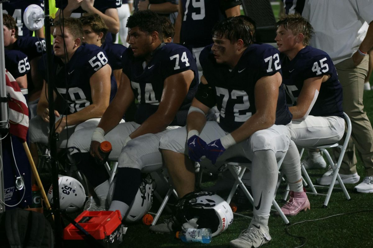 Senior defensive linemen Nick Philhour and Lamarcus Barber review film from their last drive