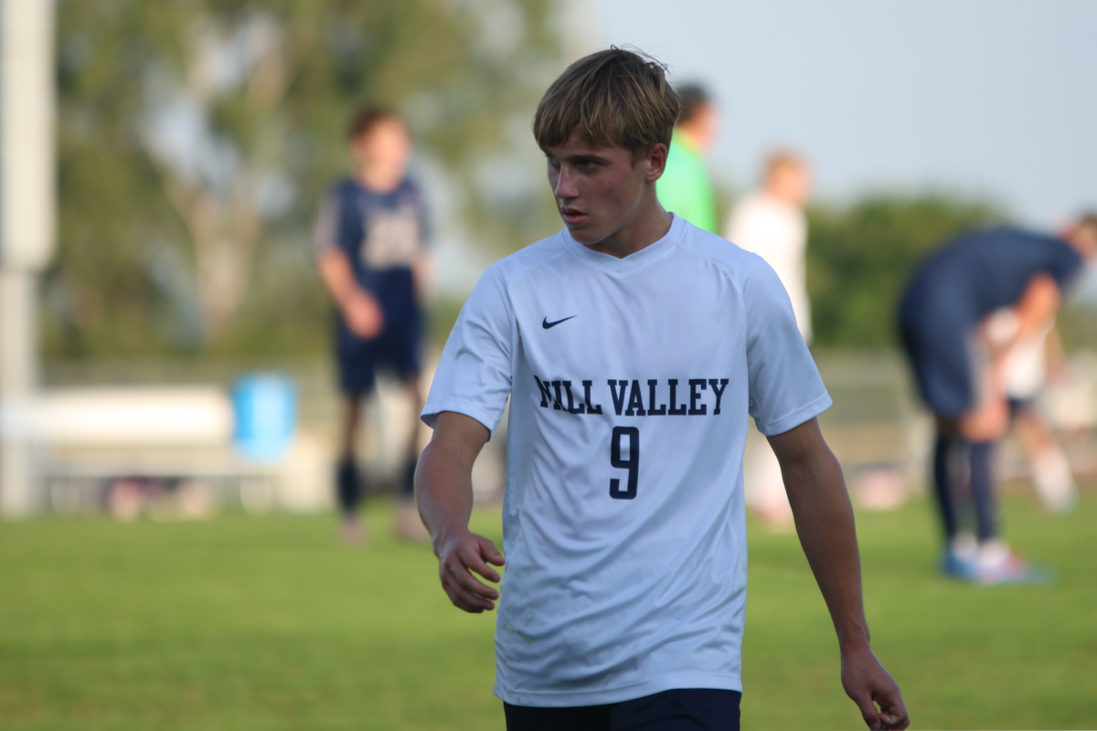 Sophomore Austin Brown walks back from a penalty kick after St. James was fouled. 