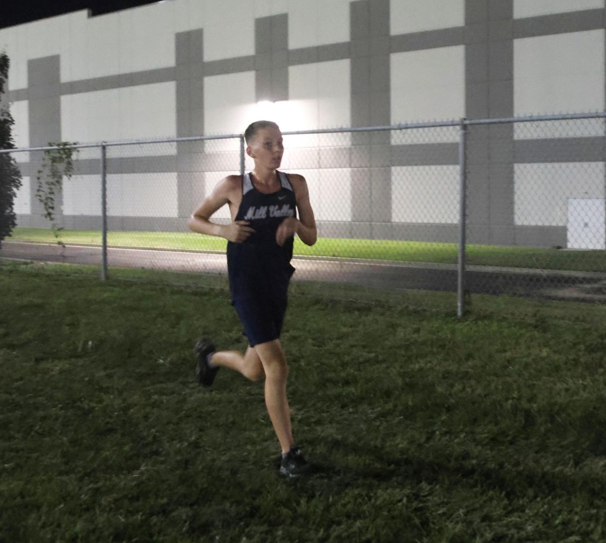 Sophomore Arthur Kaemmer runs strong through mile two. 