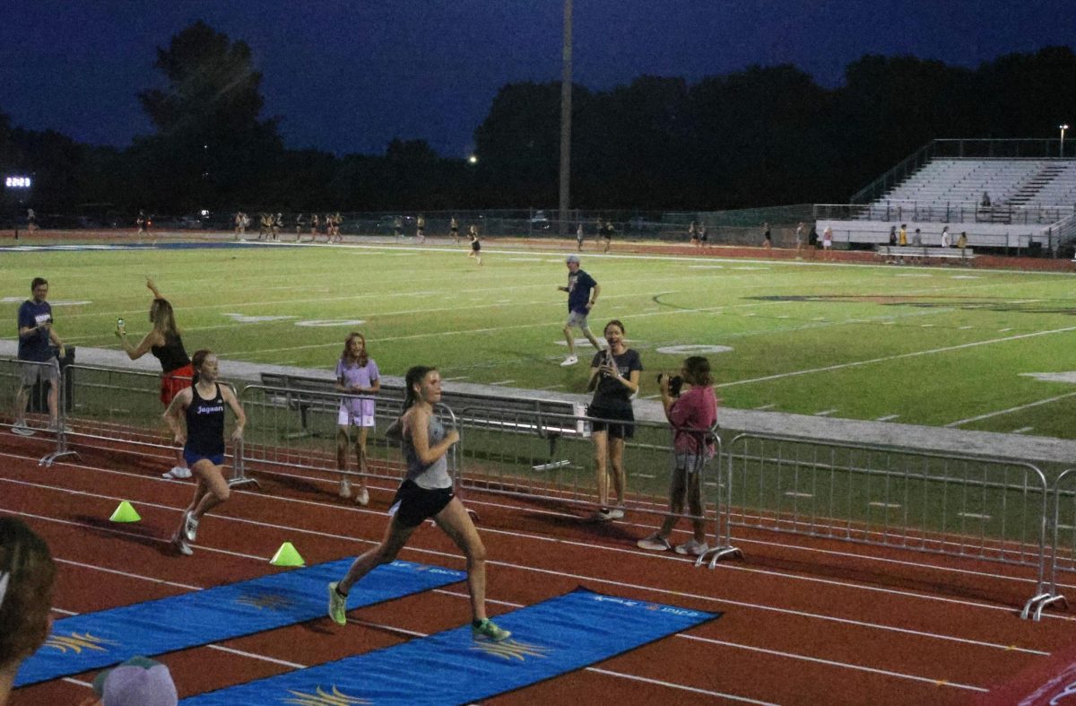 Sophomore Lindsey Maxwell beats her competitor through the finish. 