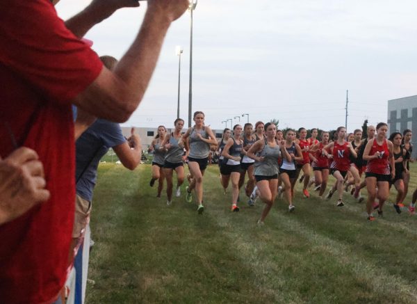 The junior varsity girls start their race off strong and focused. 