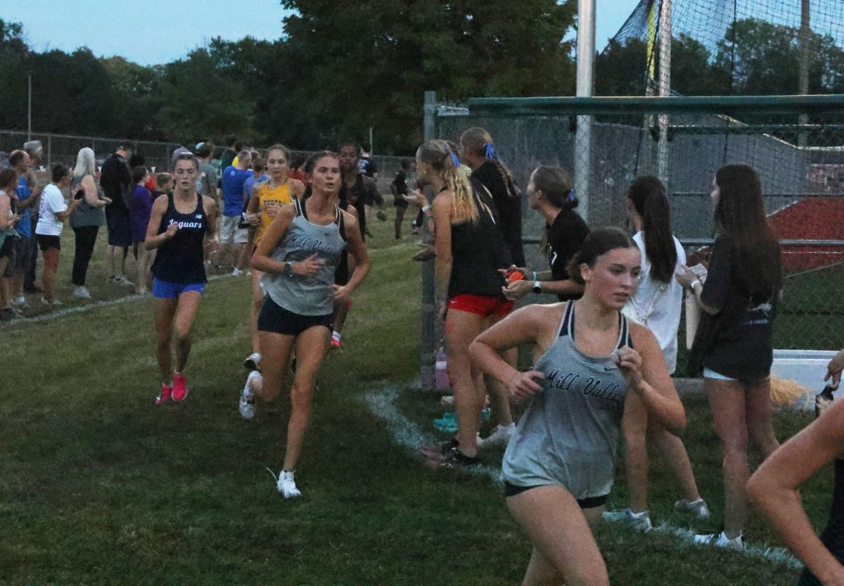 Working together, senior Mae Reynolds and sophomore Lexi Lamberson pass their opponents. 