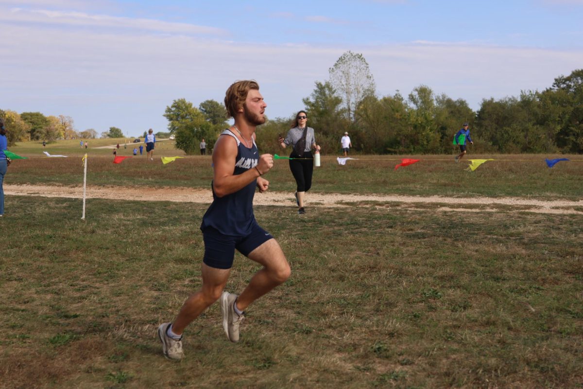 Junior Haydn Legleiter maintains his pace as he runs to the finish line.
