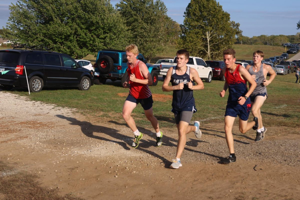 Junior Carson Schmidtlein runs fast to beat his opponents.