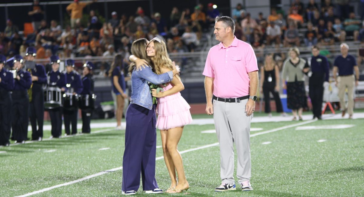 During Halftime senior Ella Jones hugs her mom after being nominated for Homecoming court
