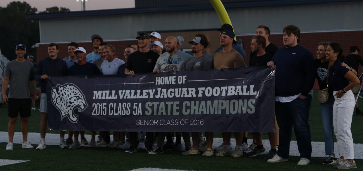 Before the game the members of the 2015 football team at Mill Valley are honored for winning the first football state championship in school history.
