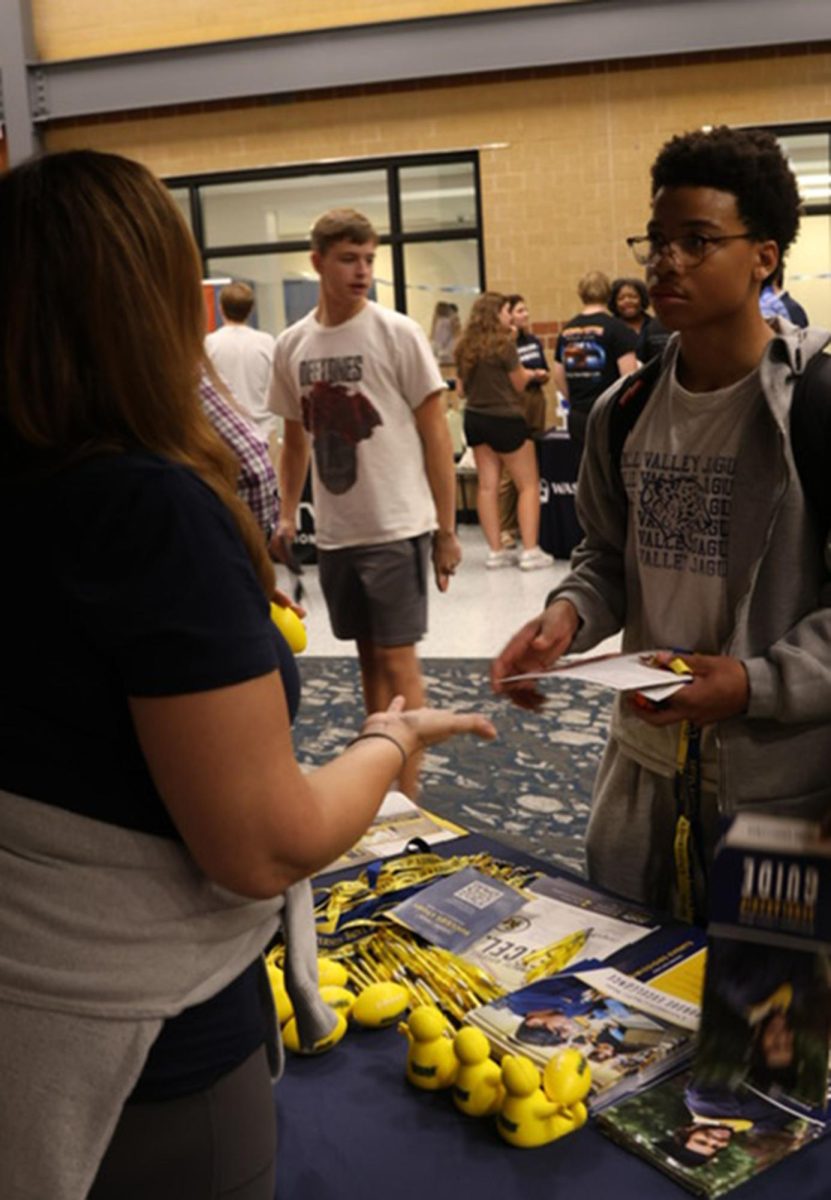 Sophomore Zion Scott explores his college options at the University of Saint Mars during the MV Next Steps event. 
