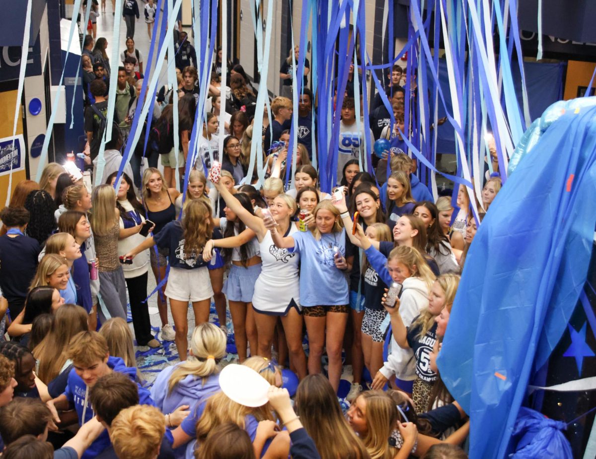Forming a circle, seniors dance and sing to songs