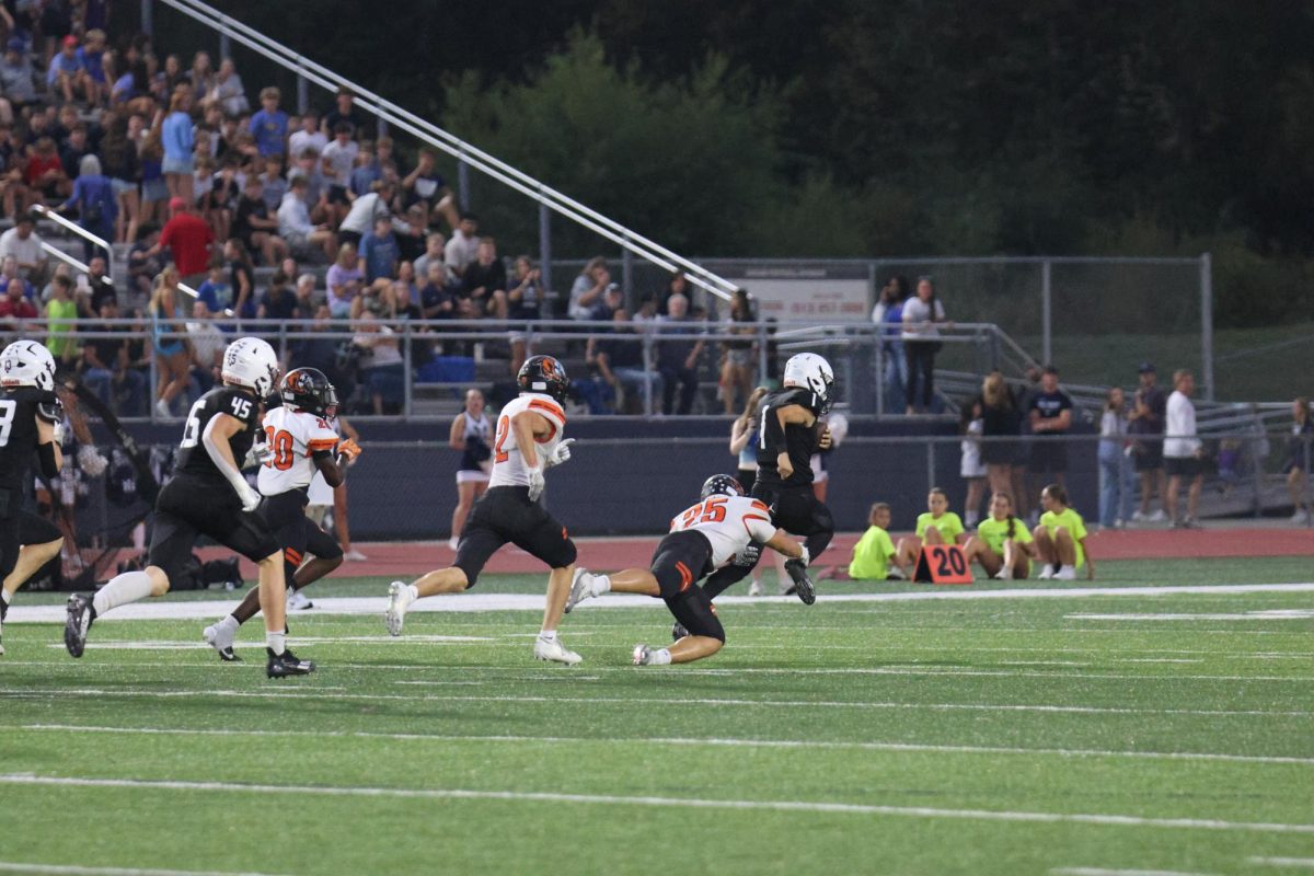 senior blake jay runs to get a first down against shawnee mission northwest on oct. 3