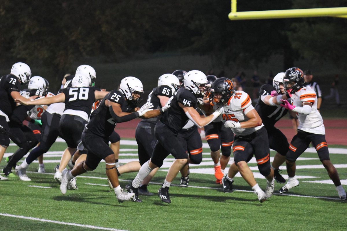Mill valleys O-line blocks shawnee mission northwest from getting to quarterback Blake Jay on oct. 3