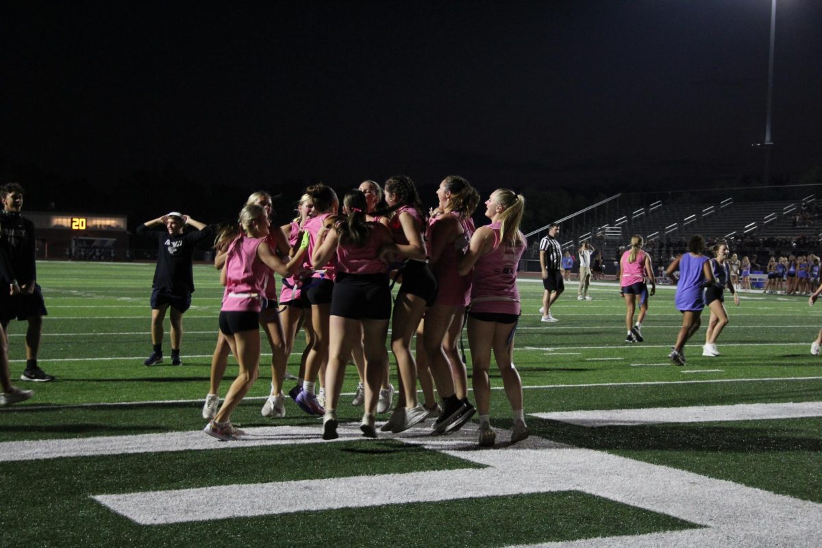 Junior Paige Frost scores the first touchdown for the junior girls as they compete against the senior team, Wednesday Oct. 1. 
