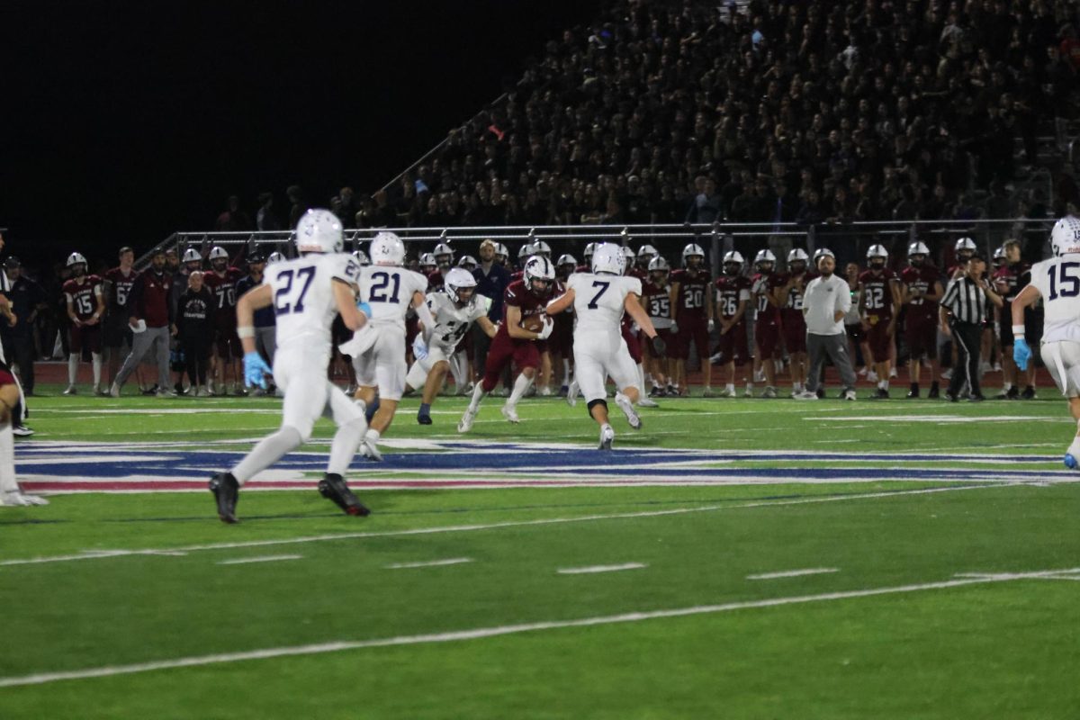 Senior Jaxon Garcia and Landon Stockwell, along with juniors Braydon Jones and Gavin Gall attempt to tackle players.
