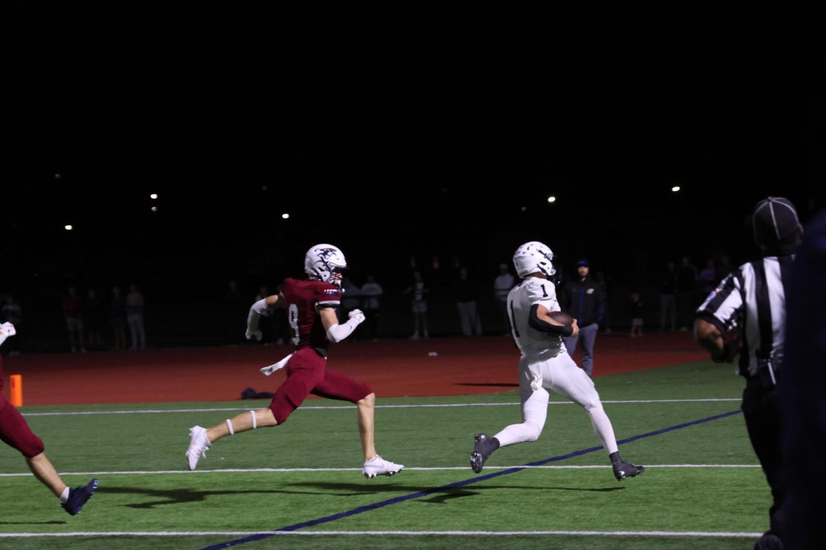 Senior Blake Jay sprints the last five yards to make a touchdown against St. James. 