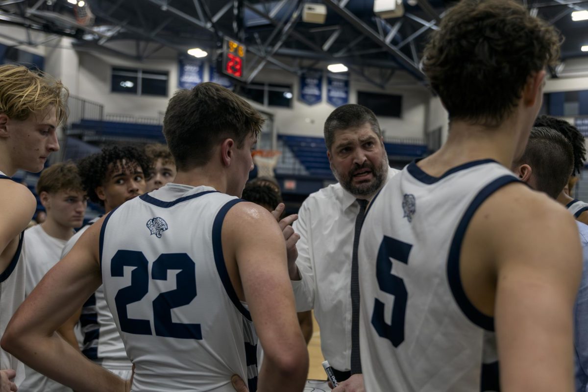 Coach Kurt Bangle pleads with the team to pay attention and give it their all
