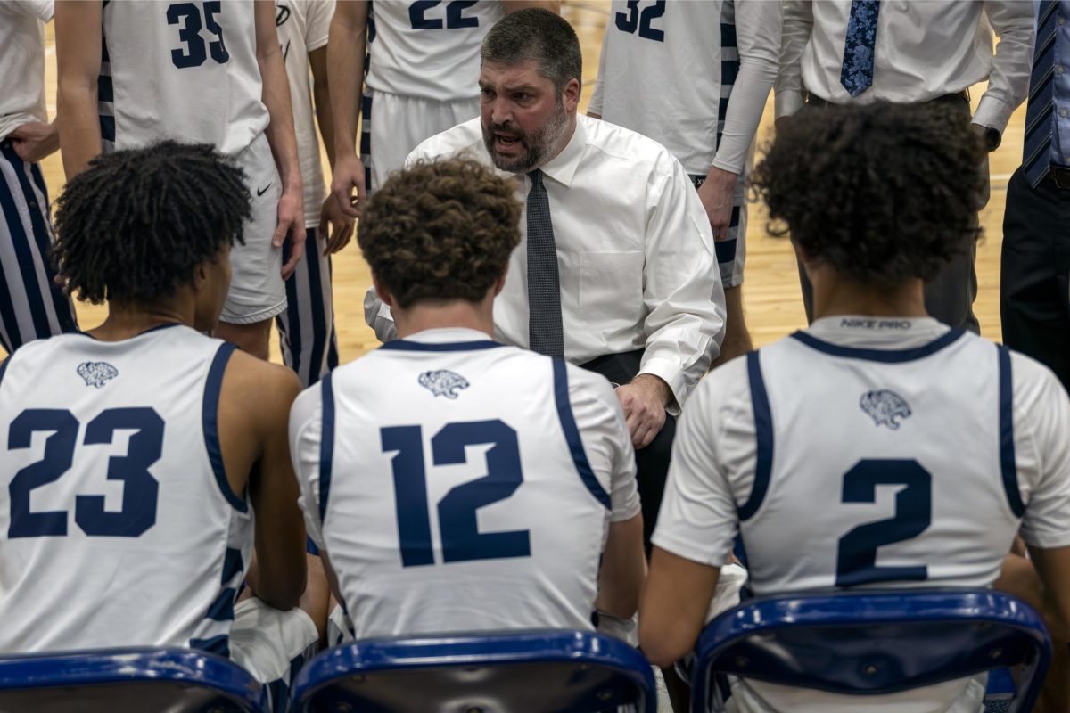 Coach Kurt Bangle yells the plan for the next play during a timeout