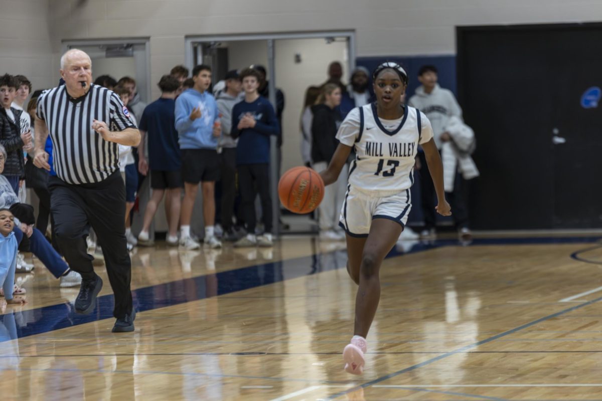 Freshman Tavia Barton dribbles towards the goal