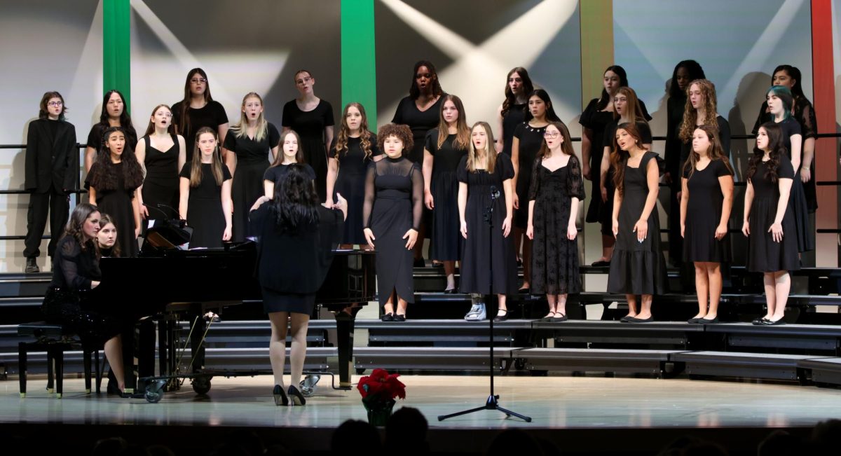 The mill valley Womens choir begins their first song Sing Me To winter on Thursday dec, 11th