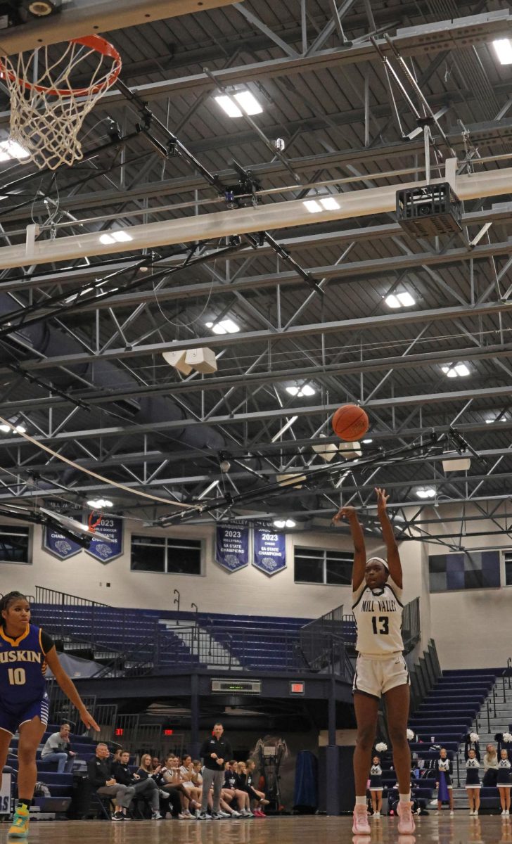 Shooting a free throw, sophomore Tavia Barton scores.