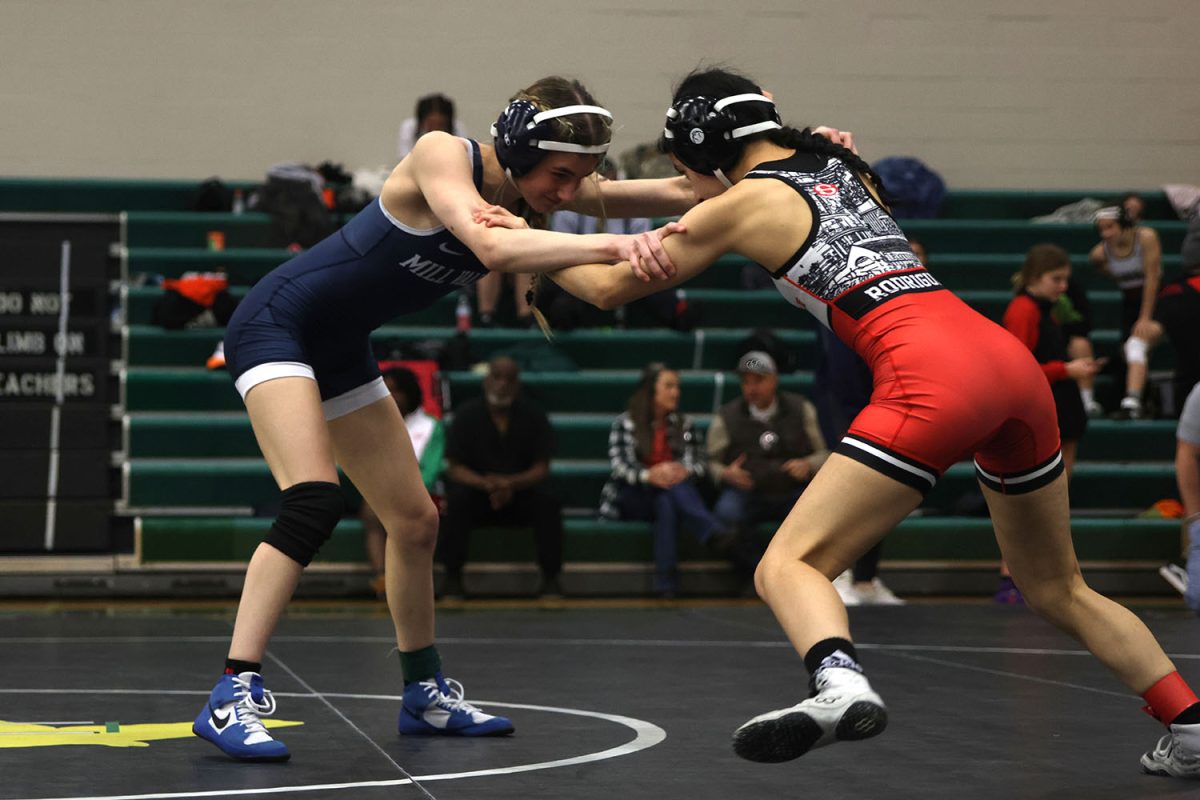 Searching for her opponent's weaknesses, junior Finley Rose prepares for a takedown, Jan. 29, 2025.