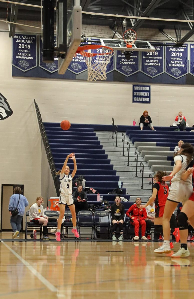 For an open three, sophomore Elin Diskin shoots the ball.