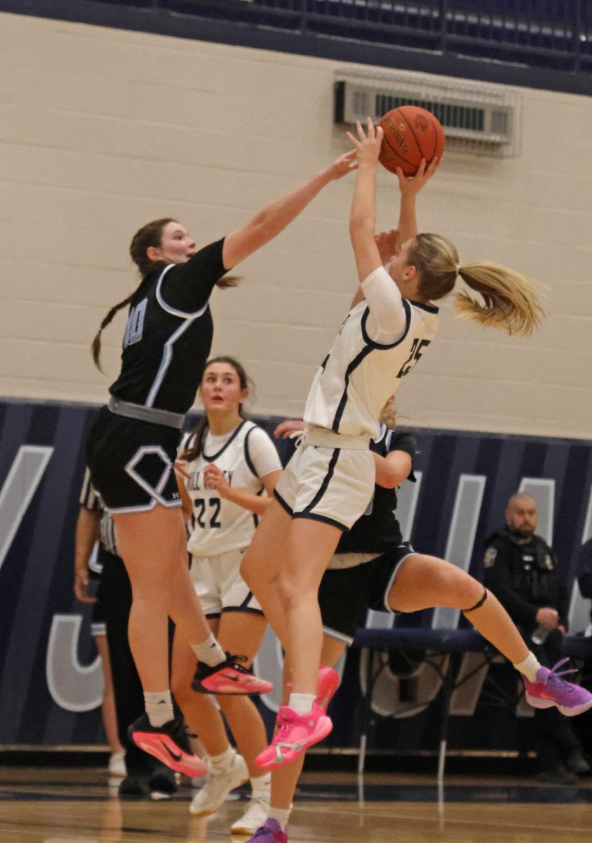 Shooting, junior Riley Marshall gets fouled and sent to the free throw line.