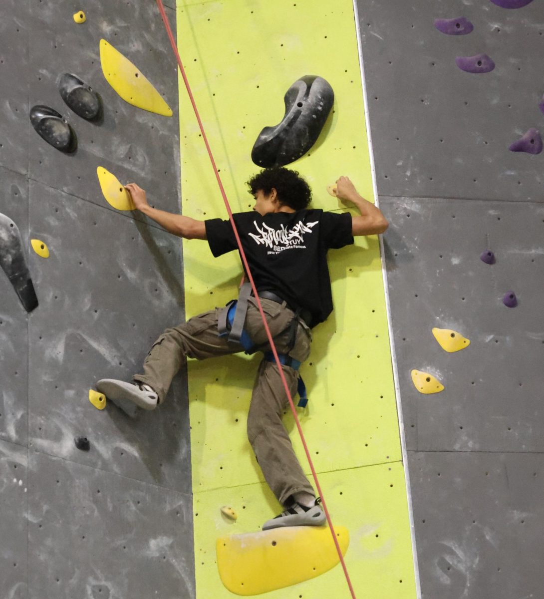 Junior Sebastian Puello tries to figure out his next move, staying within the yellow rocks.