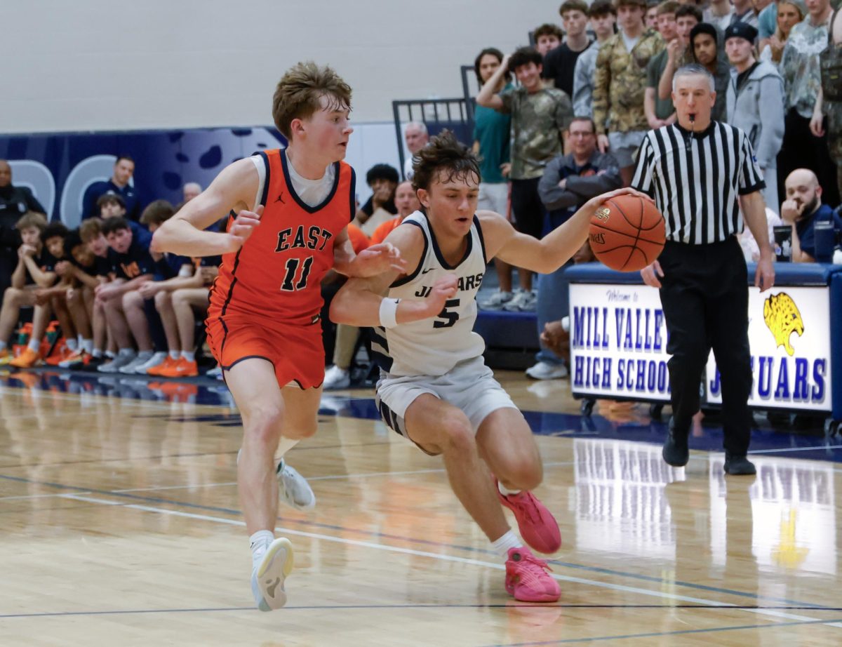 Senior Reece Reidel prevents his defender from getting the ball 