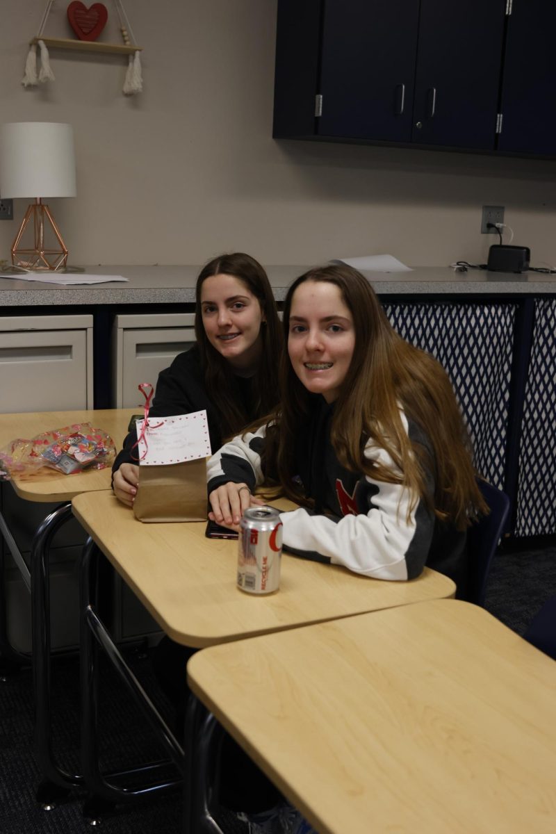 Freshman XXX and XXX very happy after they received a candy gram form the anonymous.  