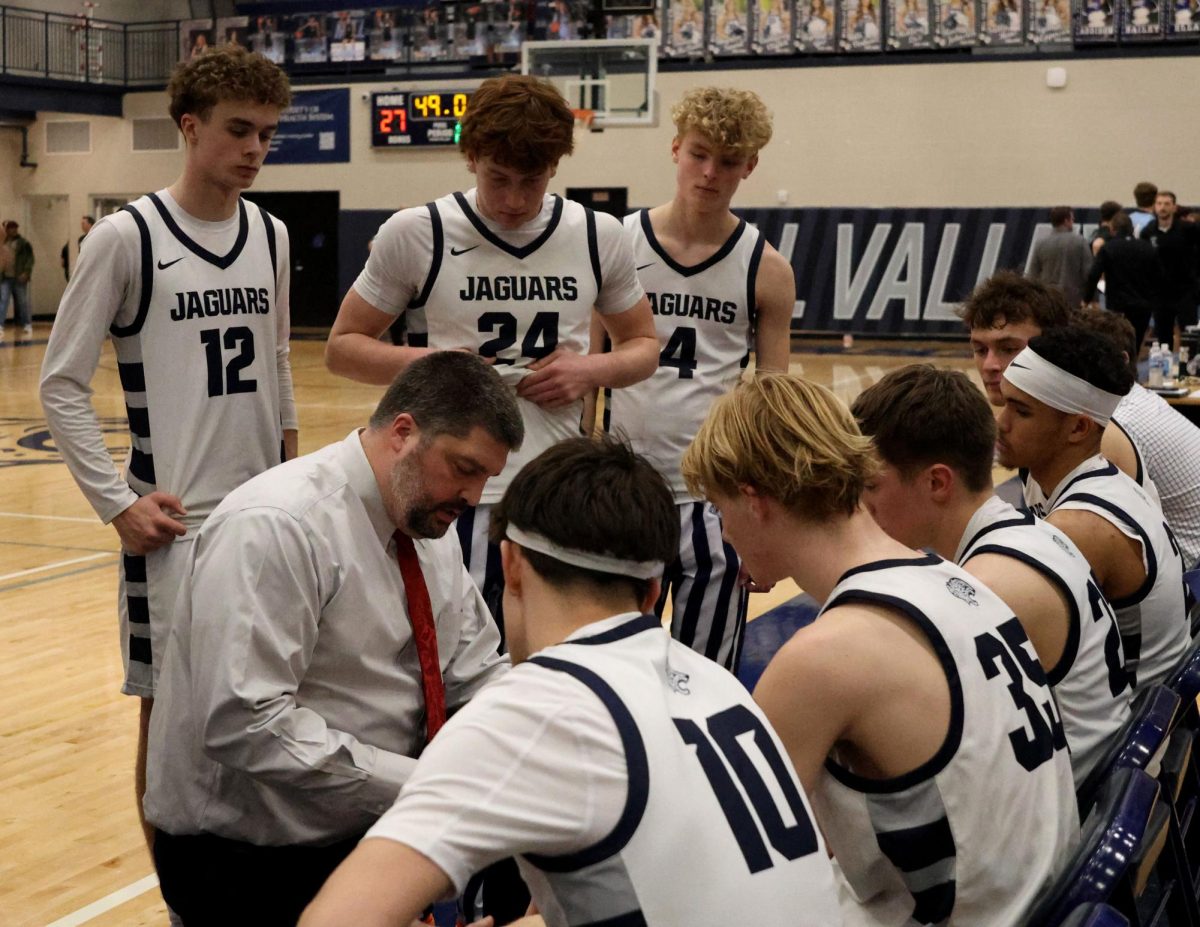 calling a timeout Head coach Kurt Bangle reviews a play 