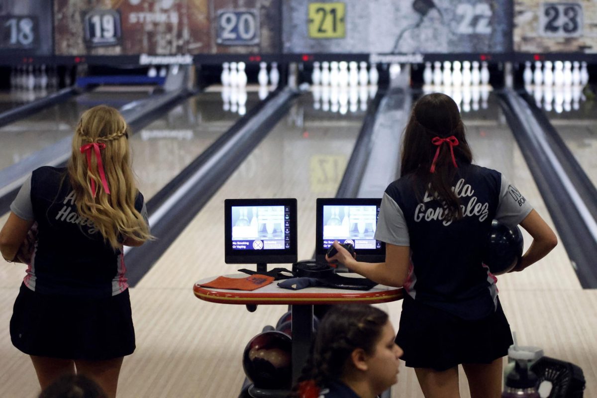 Discussing strategy seniors Layla Gonzalez and Abby Haney prepare to make their approach. 