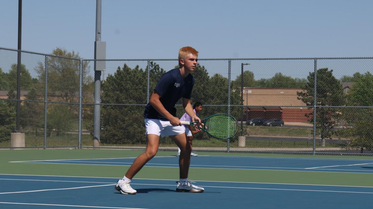On his toes, sophomore Spencer Reed prepares to receive the ball. 