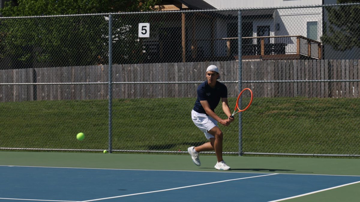 Eyes on the ball, senior Jared Anderson-Gonzalez focuses on swinging at the ball, Monday, April 30. 
