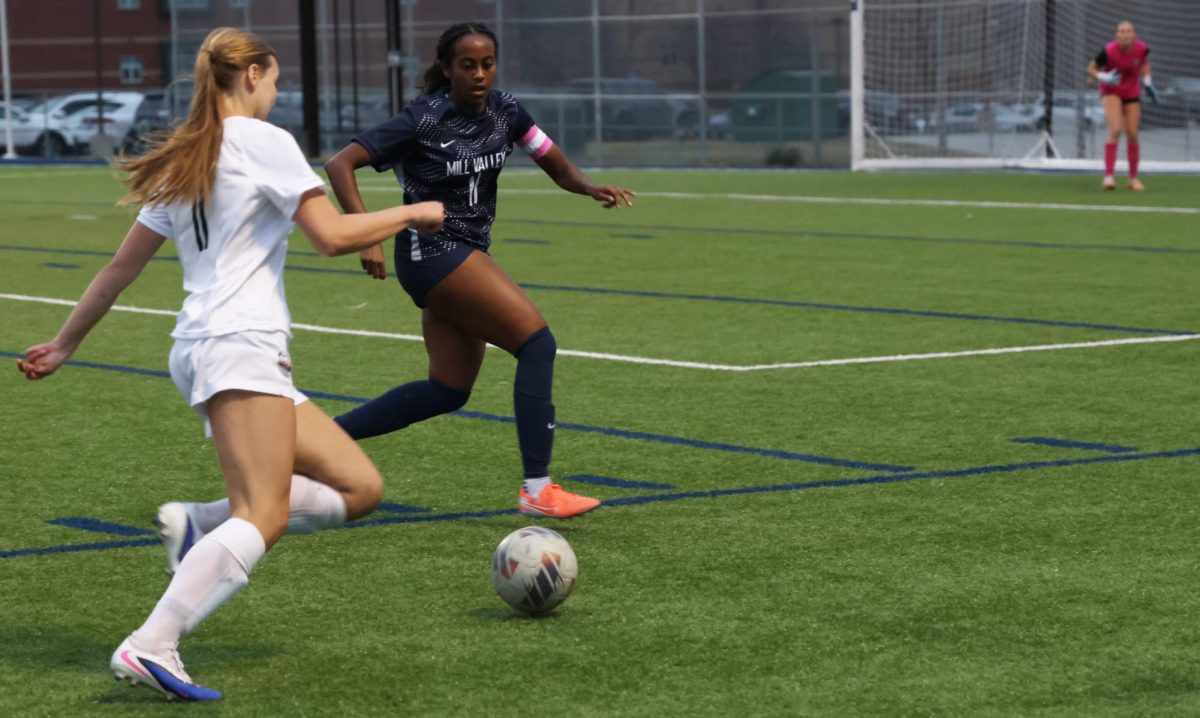 Defending the goal, junior Biti Hasabau makes sure that Lawrence Free State can’t score a goal.