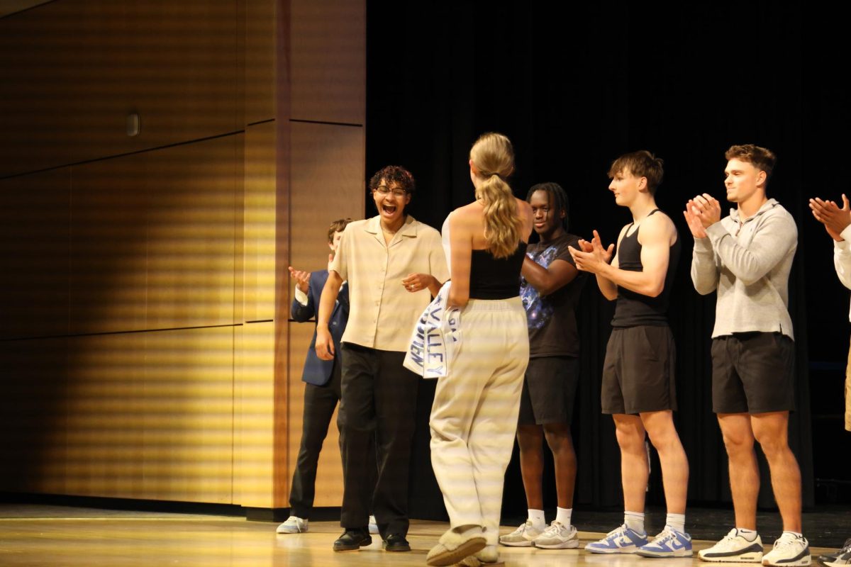 Senior Ellyott Edwards smiles with excitement as he is awarded the People’s Choice title.
