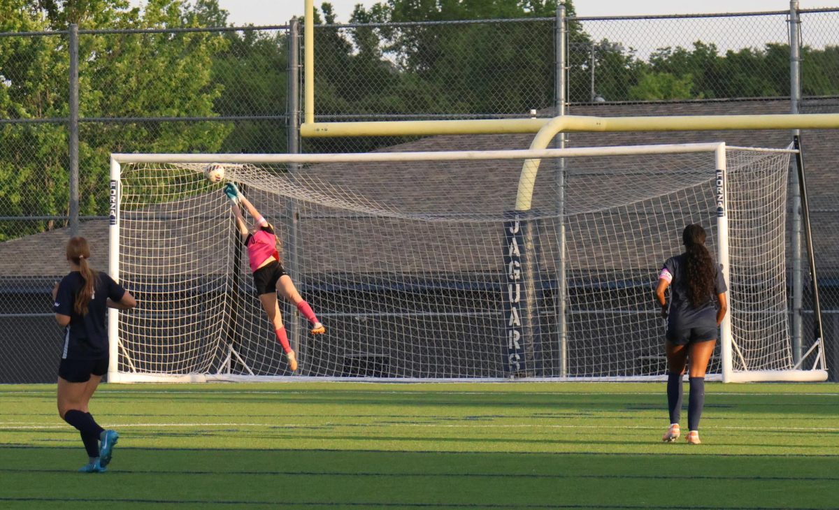 Senior Jamie Ricker with an impressive save keeps Gardner from scoring. 