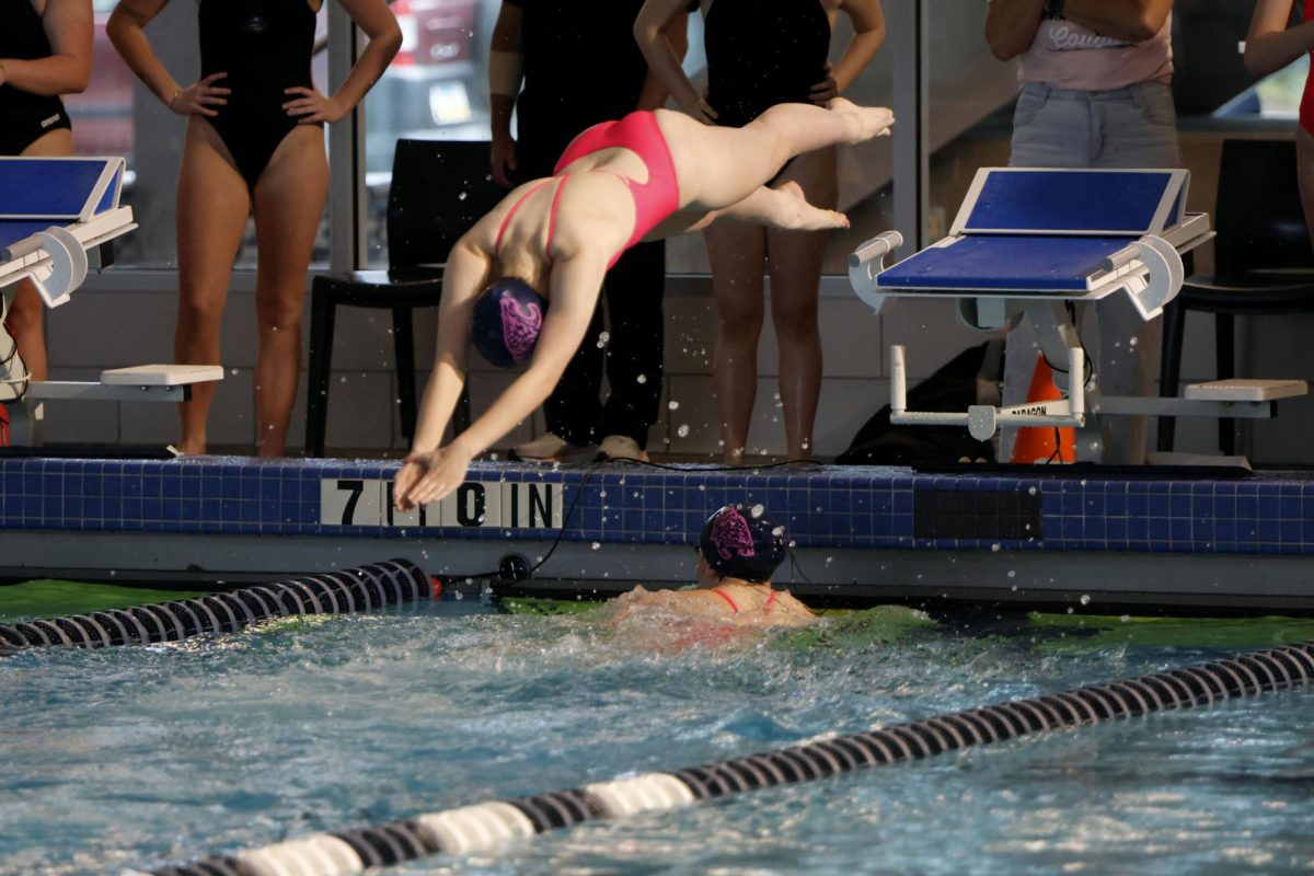 Junior Darby Hawkins prepares to start the second heat of a freestyle race. 