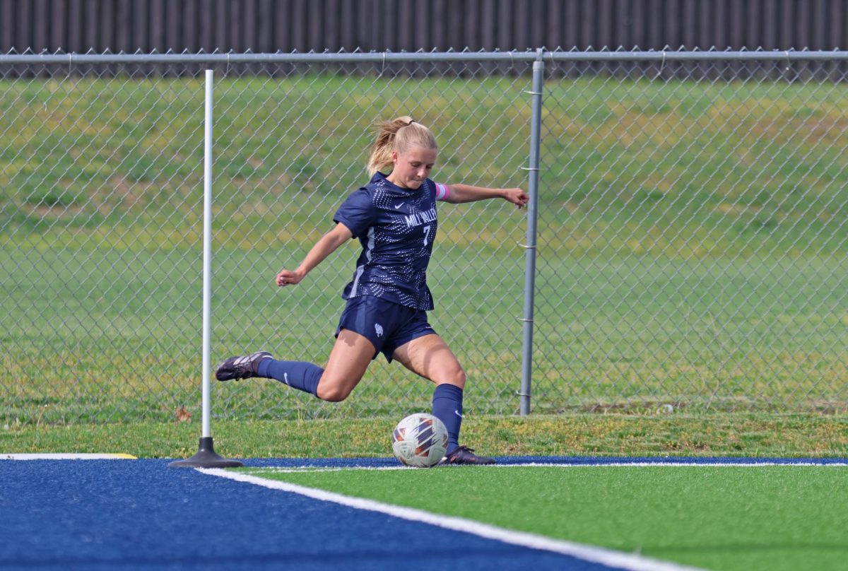 Taking the corner, senior Jenna Lloyd gives the Jags a chance to score.