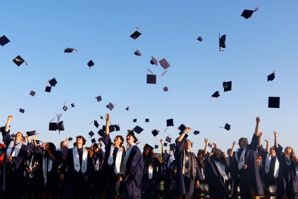 Caps in the air, class of 2026 celebrates their graduation.