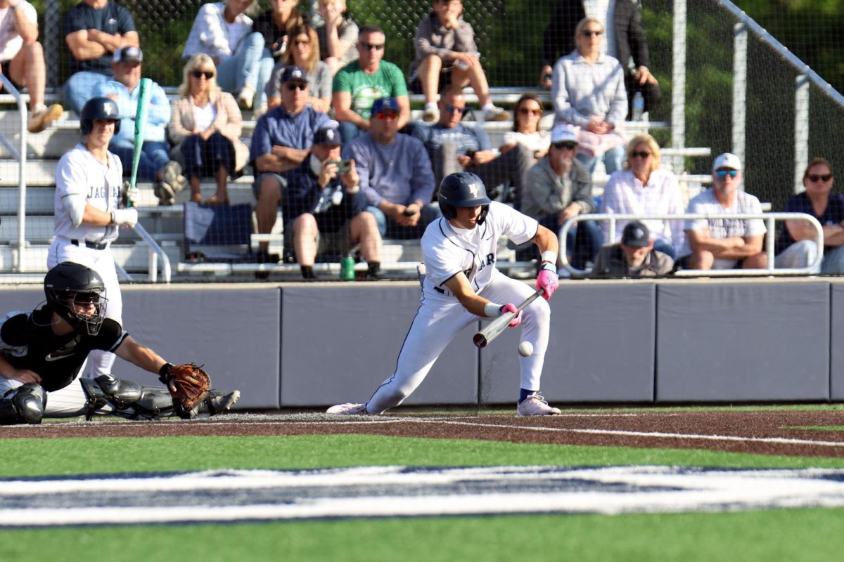 Senior Blake Jay bunts a ball to advace the runners